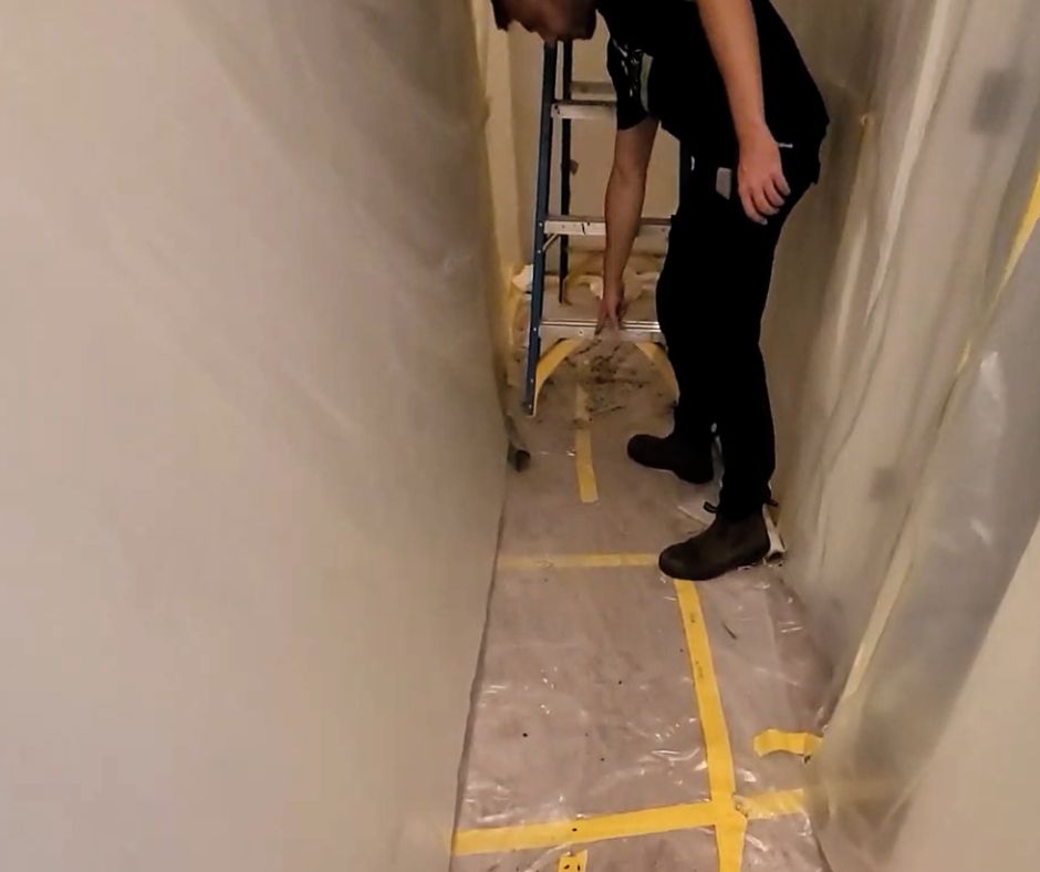 Alon from Miller Attics inspecting asbestos removal