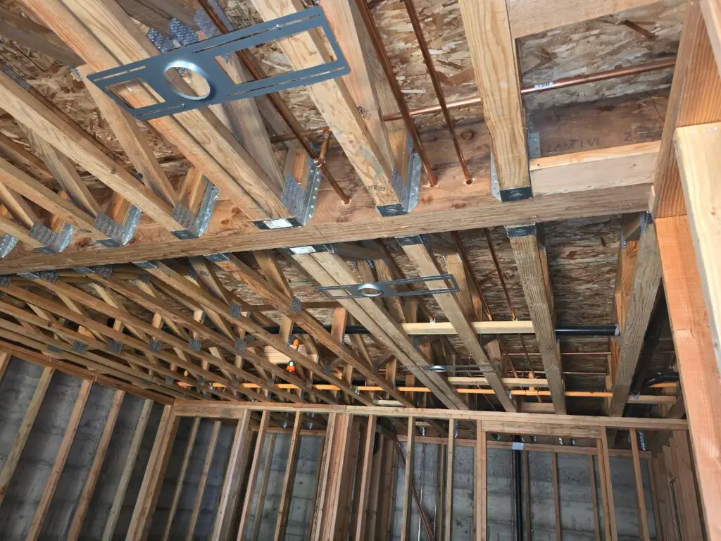 How-to-Insulate-an-Attic-Roof-Rafters-JPG