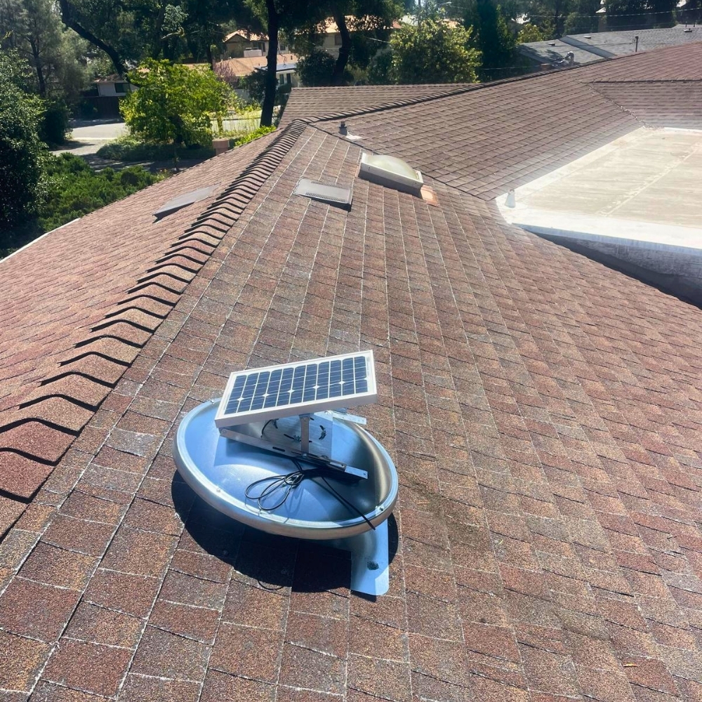 Insulation work inside a real Ross attic — Ross estate-scale homes on Ross Common and gorge-cut properties along San Anselmo Creek often need full-depth cellulose after decades of decay in deferred-maintenance estates